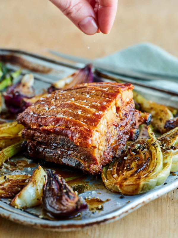 Crispy pork belly with roasted fennel & red onion